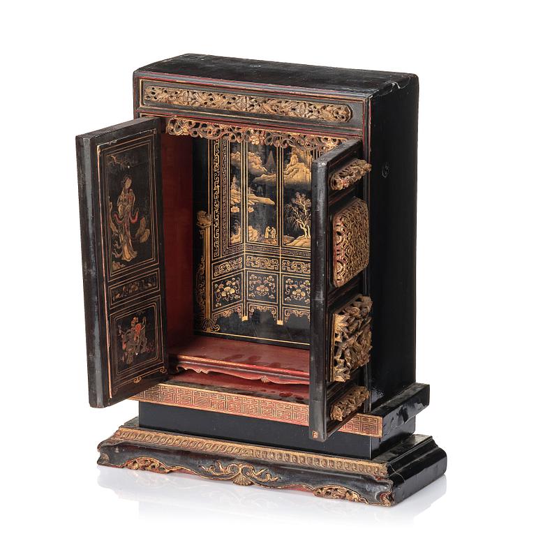 A Chinese altar cabinet, Qing dynasty, 19th Century.