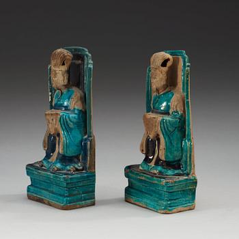 Two turquoise and purple glazed figures of daoistic dignitaries, Ming dynasty, 17th Century.