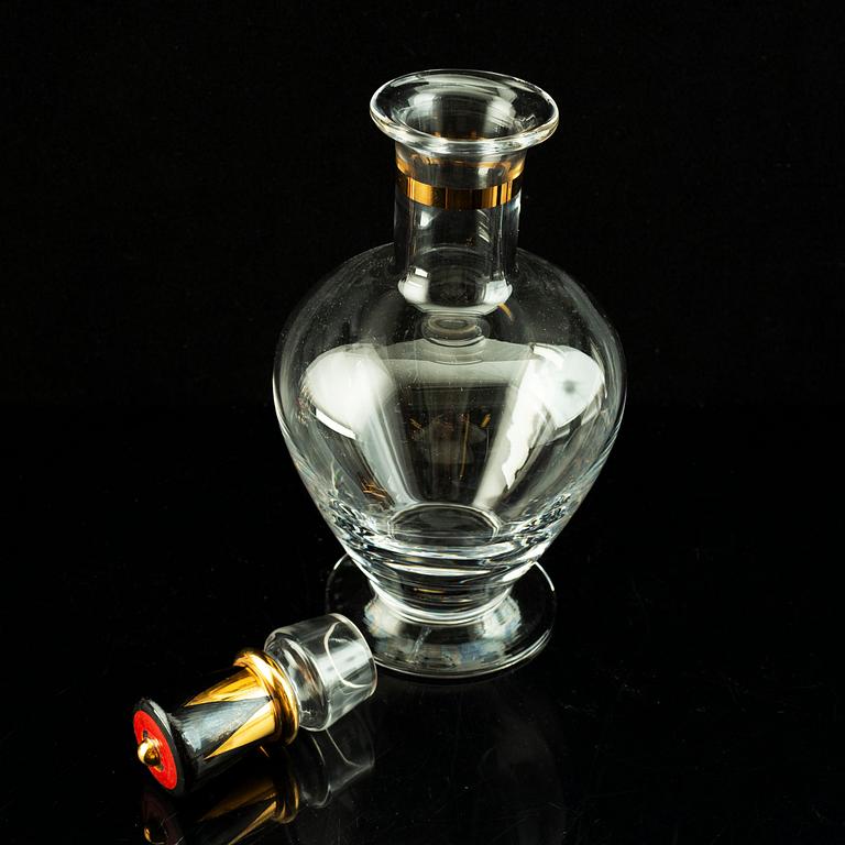 Gunnar Cyrén, a set of six "Devil" shot glasses and a decanter from the "Nobel" series, Orrefors Sweden post 1996.