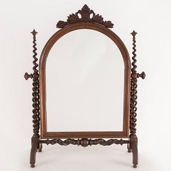 A late 19th century oak mirror.