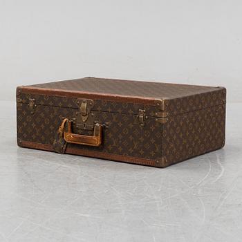 Louis Vuitton, a monogram canvas 'Bracken' suitcase, mid 20th Century.