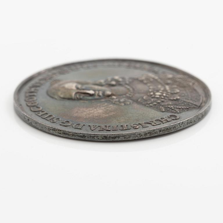 Minnespening, Kristina utkorad till drottning efter faderns död 1632, av Sebastian Dadler (medaljgravör, 1586-1657).
