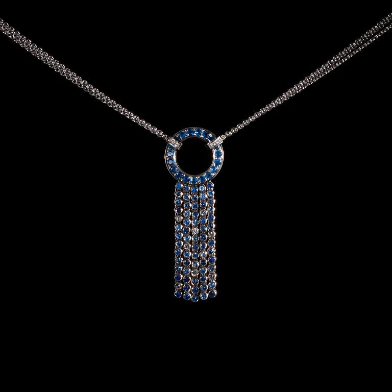 A JEWELLERY SET, 18K white gold, diamonds c. 0.18 ct, sapphires 28.45 ct. K. Saarikorpi 2010. Gold weight 101 g.