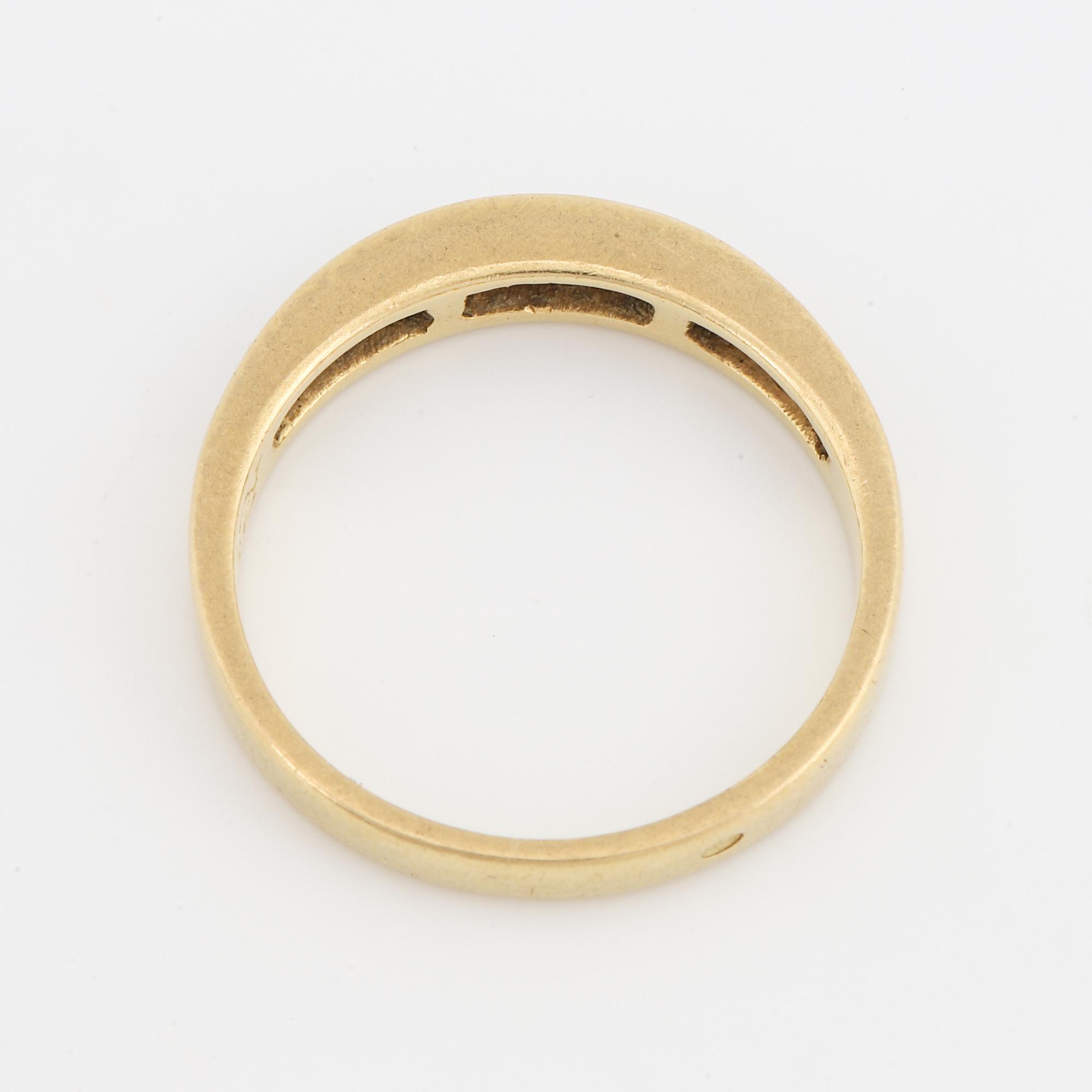 Step-cut diamond ring.