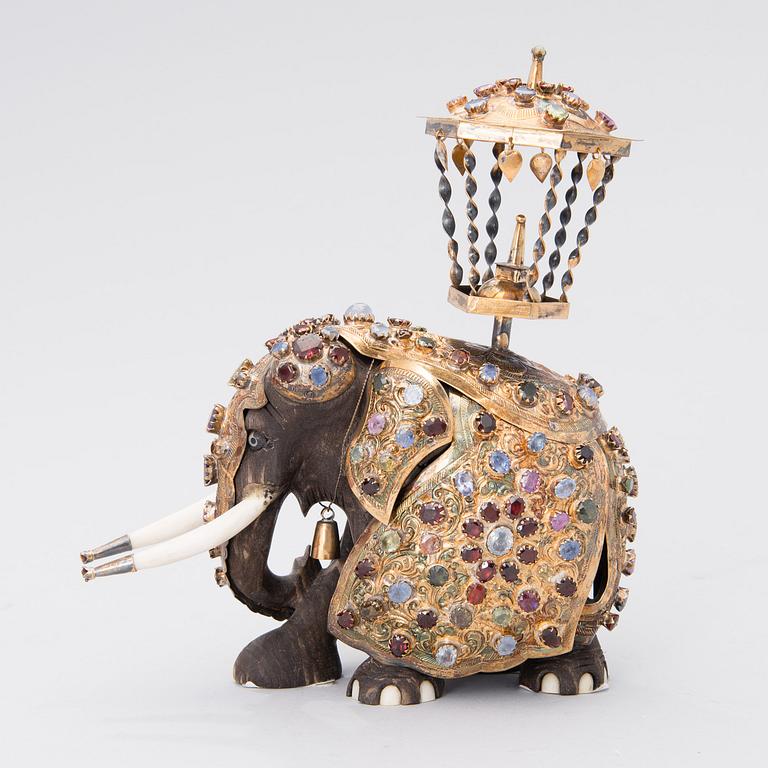 A SRI LANKAN ELEPHANT SCULPTURE, wood, silver and semi-precious stones, second half of the 20th century.