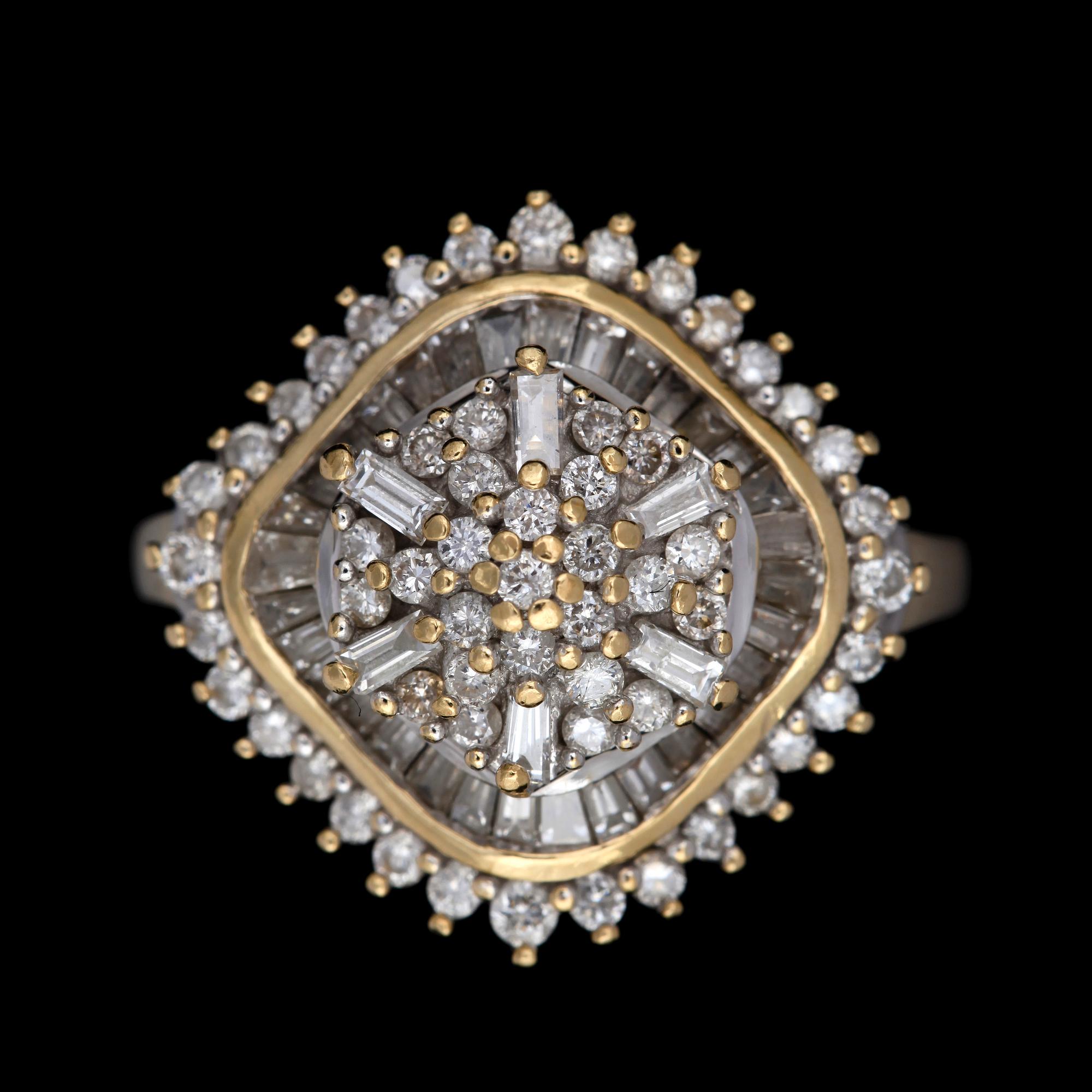 RING, 18k guld med briljant- o baguettslipade diamanter tot ca 2,12ct. Vikt 8,5g.