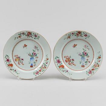 A famille rose dish and two dinner plates, Qing dynasty, Qianlong (1736-95).