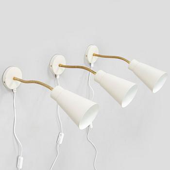 A set of three mid-20th century wall lights, model AH6, for Itsu Finland.