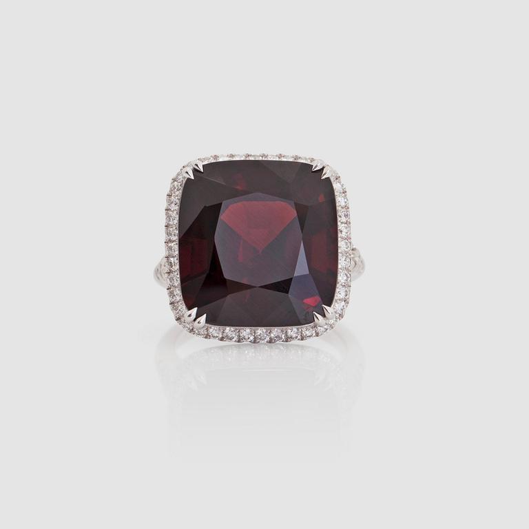 A red spinel, 18.67 cts, ring. Two certificates, AGGL, SGL.