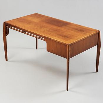 A Carl-Axel Acking Swedish Modern mahogany desk, Nordiska Kompaniet, 1950's.