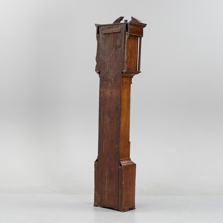 A mahognay long case clock from around the year 1800, H Bunyan Lincoln.