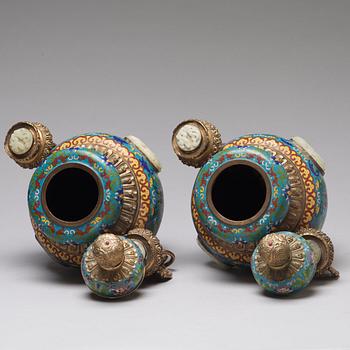 A pair of chinese cloisonne jars with covers with nephrite placques, 20th Century.