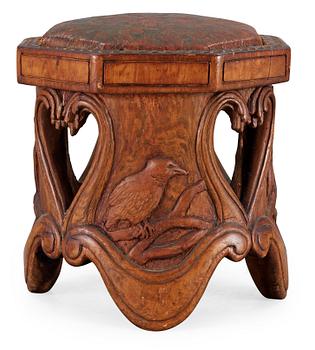 493. An Art Noveau sculptured pine stool probably by Knut Fjaestad, Sweden early 1900's.