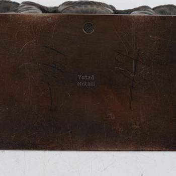 Oscar Antonsson, a pair of bronze book rests, Ystad Metall, Sweden, first half of the 20th century.
