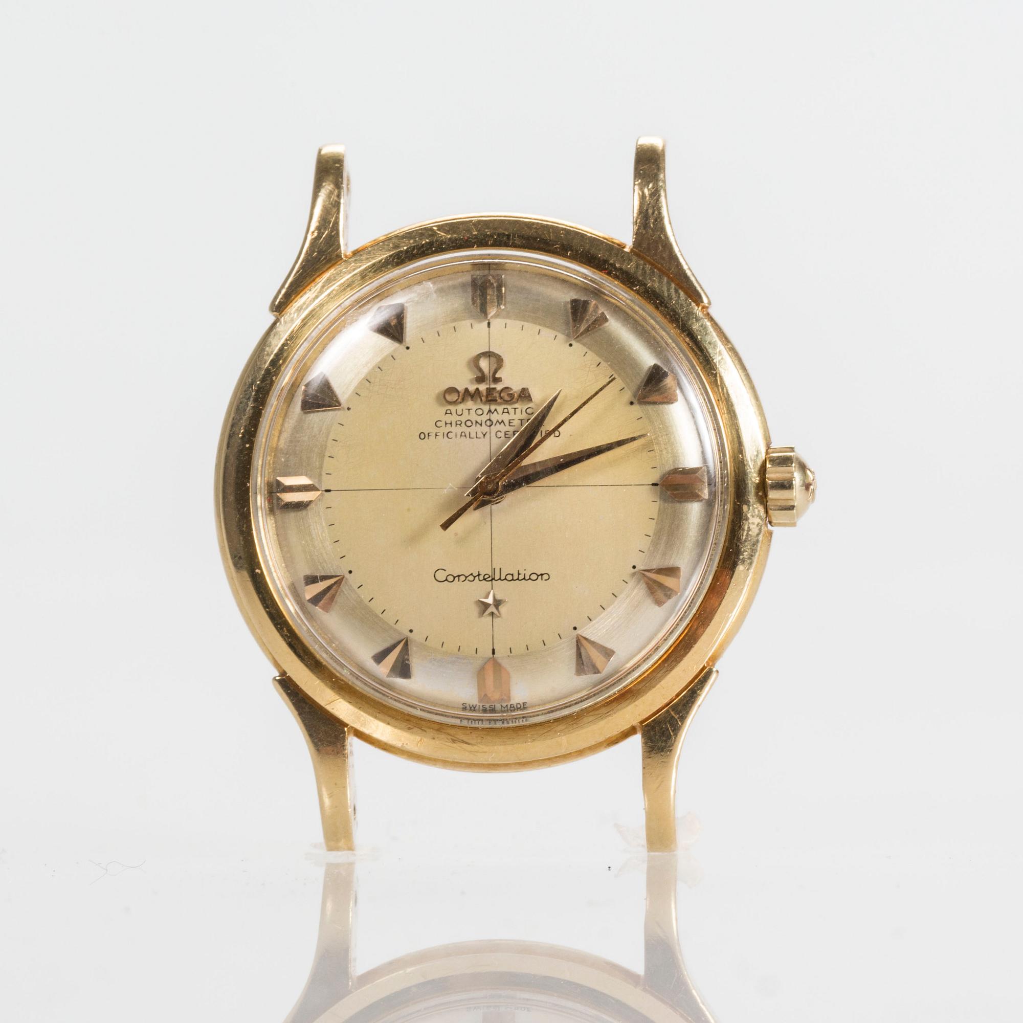HERRARMBANDSUR, 18 K guld, Omega, Automatic Chronometer, Constellation, ca 1950-tal.