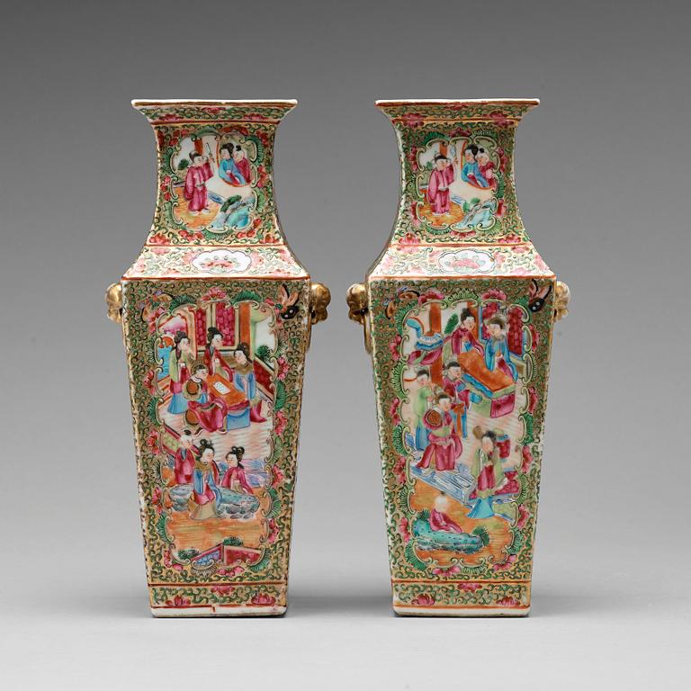 A pair of Canton famille rose vases, Qing dynasty, 19th Century.