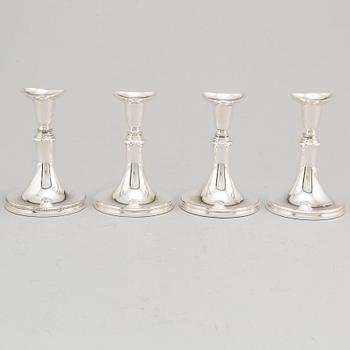 A set of four Swedish silver candlesticks, maker's mark Erik Löfman, Uppsala 1971-1973.