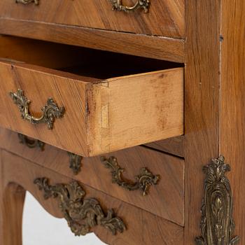 A chest of drawers, Louis XVI style, early 20th Century.