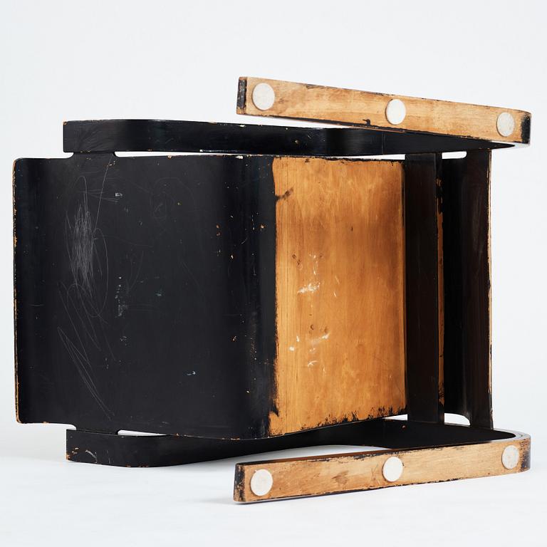 Alvar Aalto, a black lacquered birch cantilevered armchair, "nr 42", O.y Huonekalu-ja Rakennustyötehdas, Finland, 1930's.