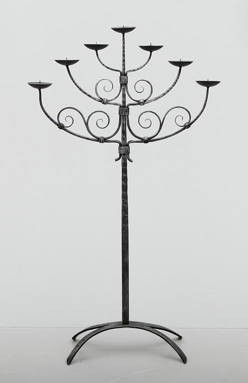 GOLVLJUSSTAKE, smide, 1900-talets mitt.