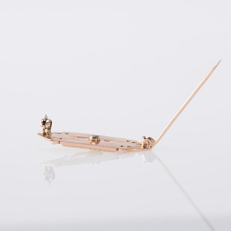 BROSCH, 14K guld, emaljering, briljantslipad diamant ca 0,12 ct. Ryska stämplar 1900-talets slut. Vikt 8,1 g.