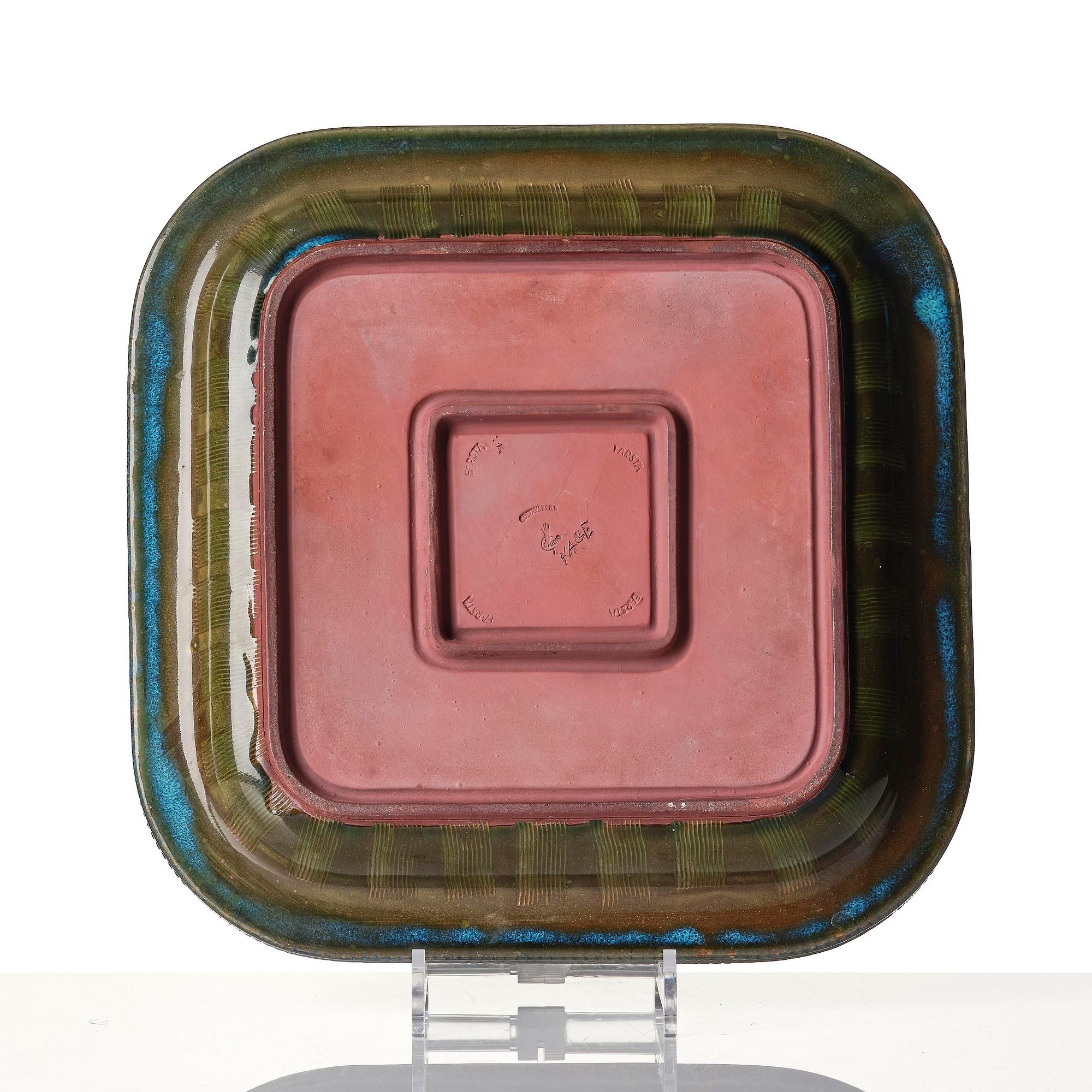 Wilhelm Kåge, a "Farsta" stoneware dish decorated with a face, Gustavsberg Studio, 1957.