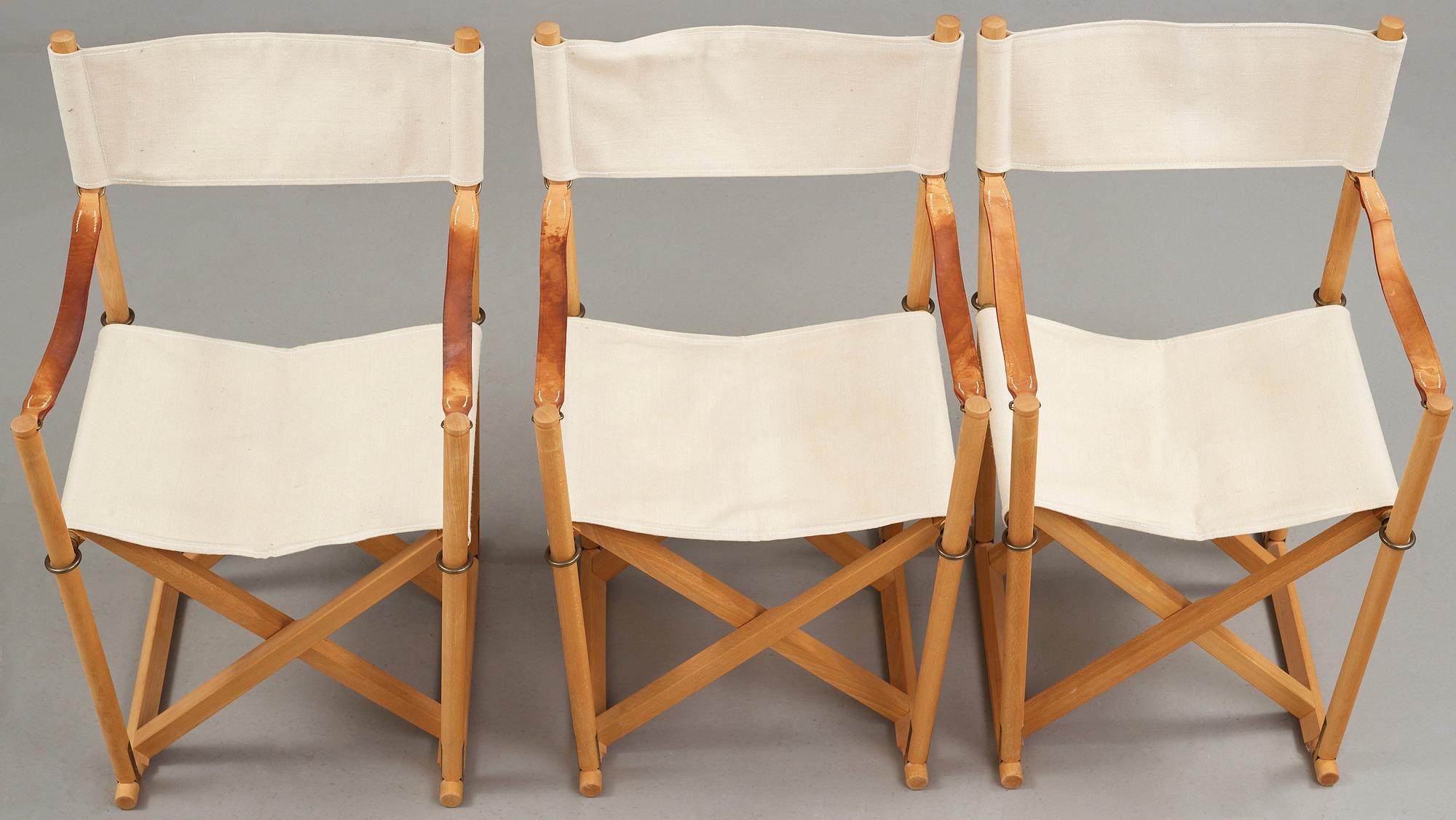 Mogens Koch, a set of six beech and canvas 'MK16' folding chairs, comes with a stand for storage, Rud Rasmussen, Denmark.