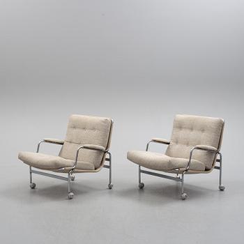 A pair of 'Karin' easy chairs by Bruno Mathsson for Dux, second half of the 20th century.