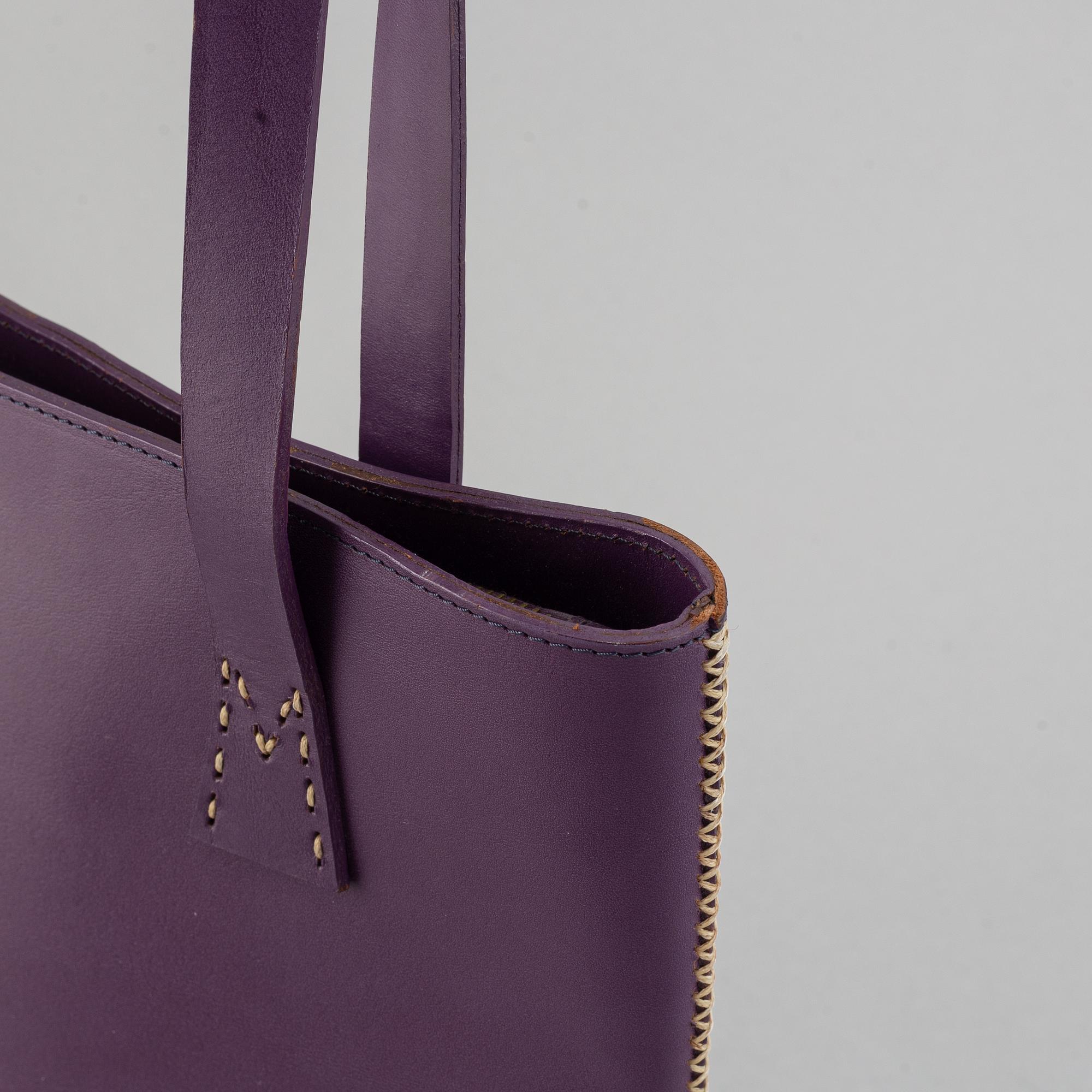 Mulberry, a purple leather handbag.