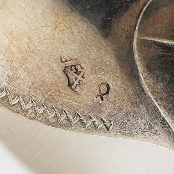Two silver serving spoons with pseudo-marks, around the year 1900.