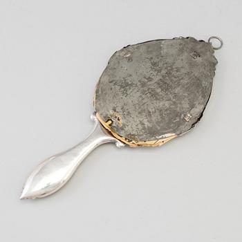 A silver hand mirror, Stockholm 1864.