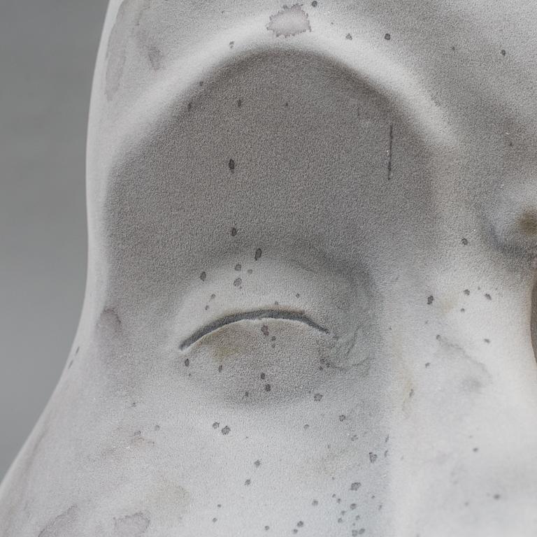 A stone head figure made by JoAnn Tan Studio for NK 2016.