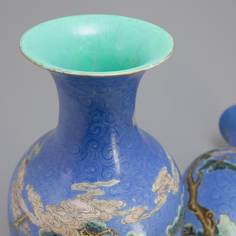 A pair of figural vases, late Qing dynasty, with Qianlong mark, about 1900.