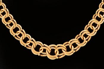 Collier 18K guld, doserad Bismarck-länk, 47,7 g, längd och bredaste del  ca 48 x 1 cm.