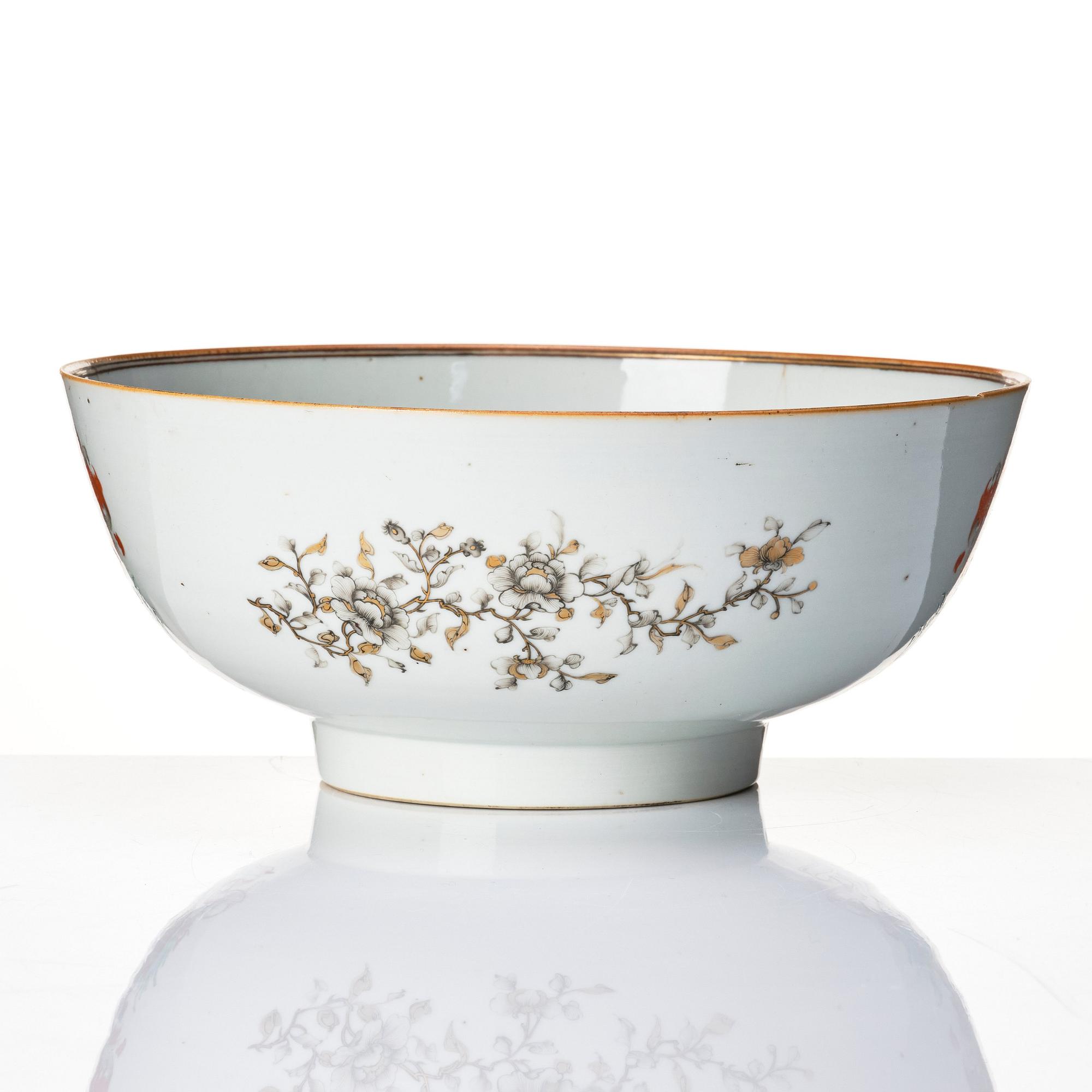 A famille rose and grisaille armorial punch bowl, Qing dynasty, 18th century.