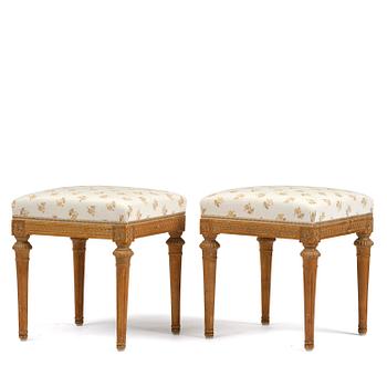 94. A pair of Gustavian stools by E. Öhrmark (master in Stockholm 1777-1813).