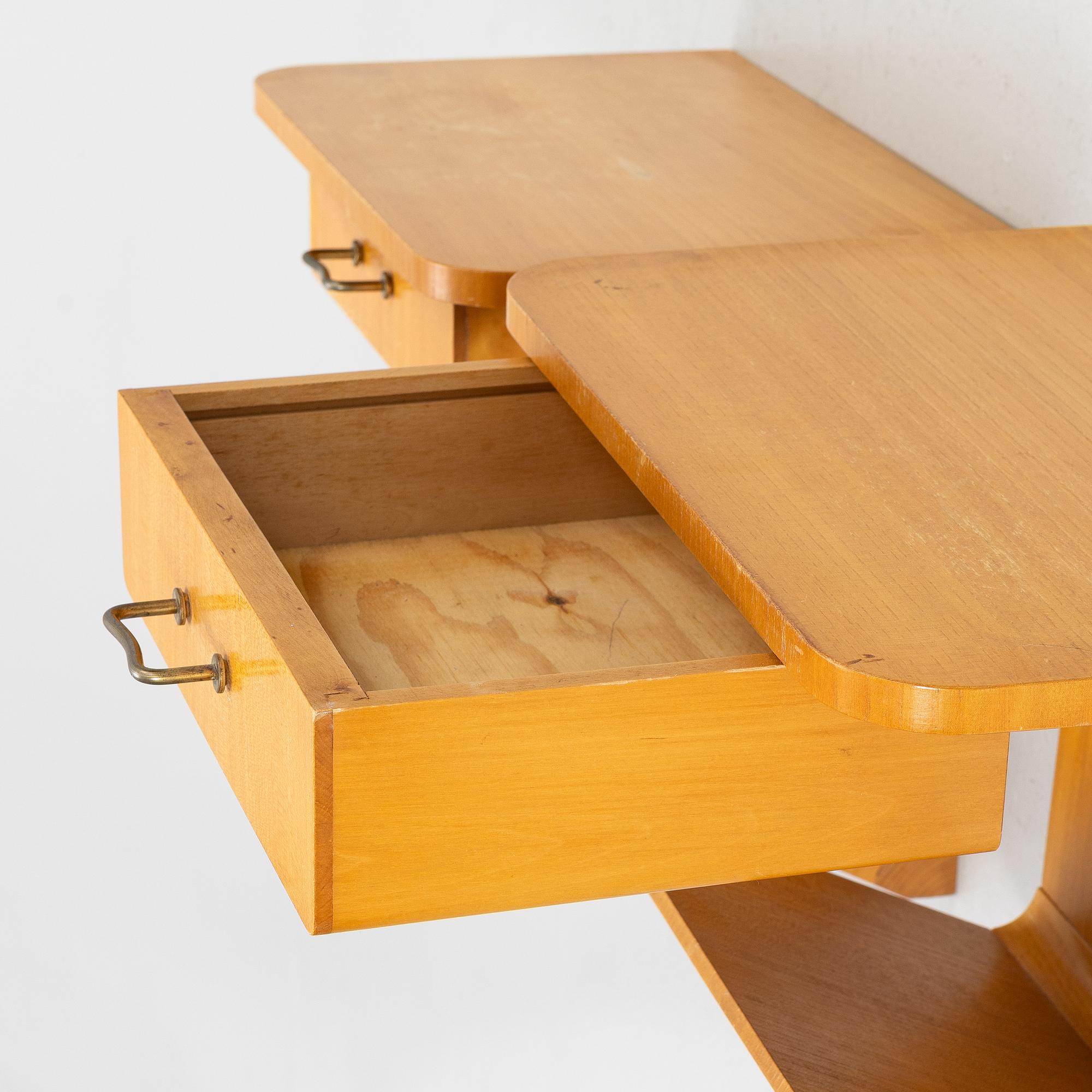 Bedside tables, a pair, wall-mounted, second half of the 20th century.