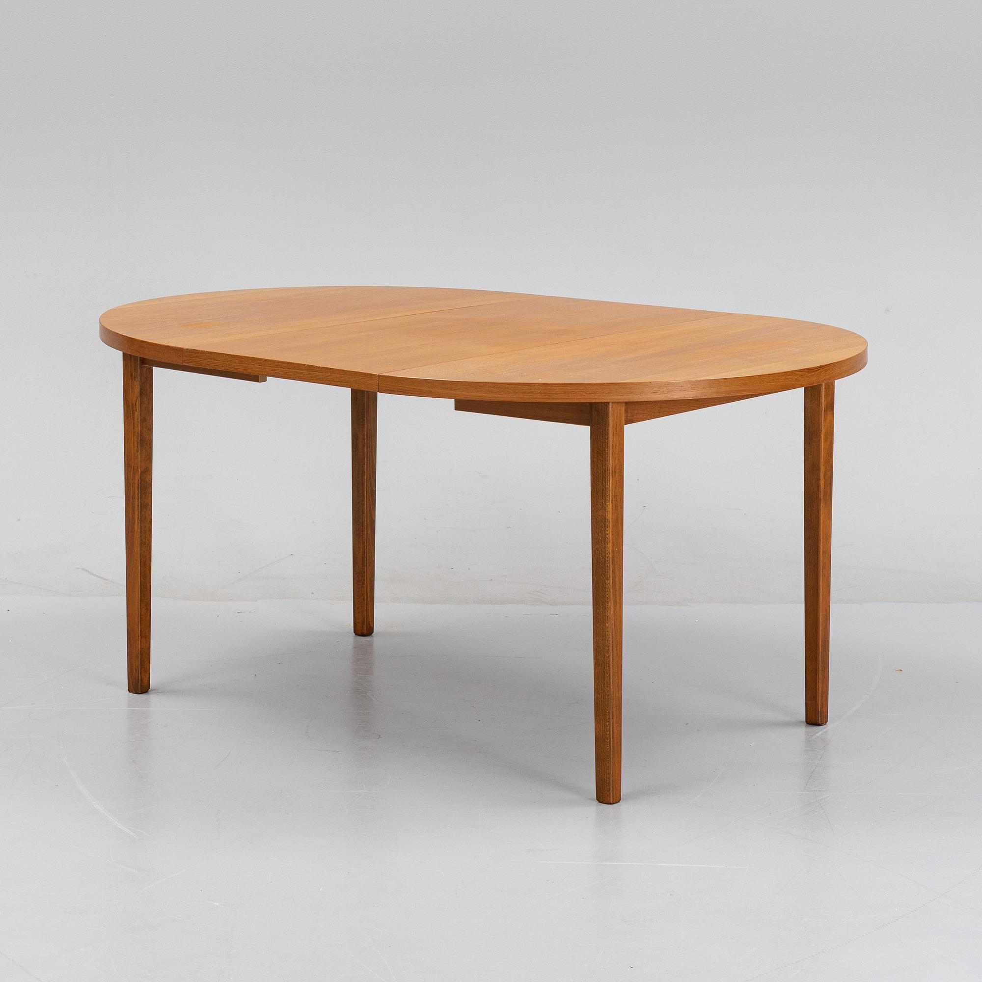 A teak dining table, second half of the 20th century.