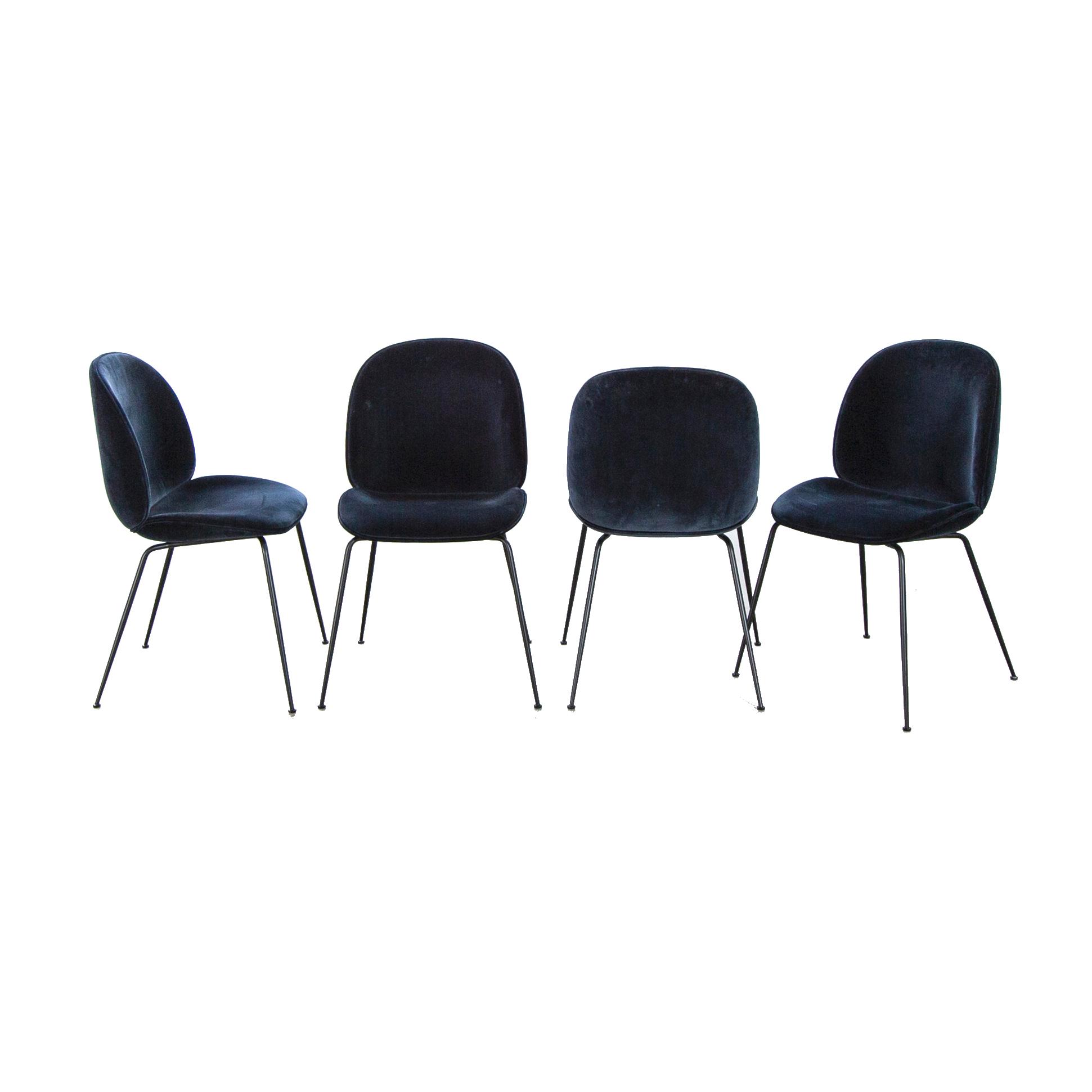 A set of four Beetle dining chairs by Gamfratesi for Gubi 2013.