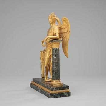 A French Empire early 19th century gilt bronze and verde antico marble table sculpture.