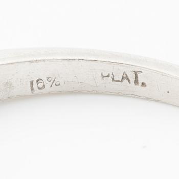 Platinum ring with baguette-cut diamonds.
