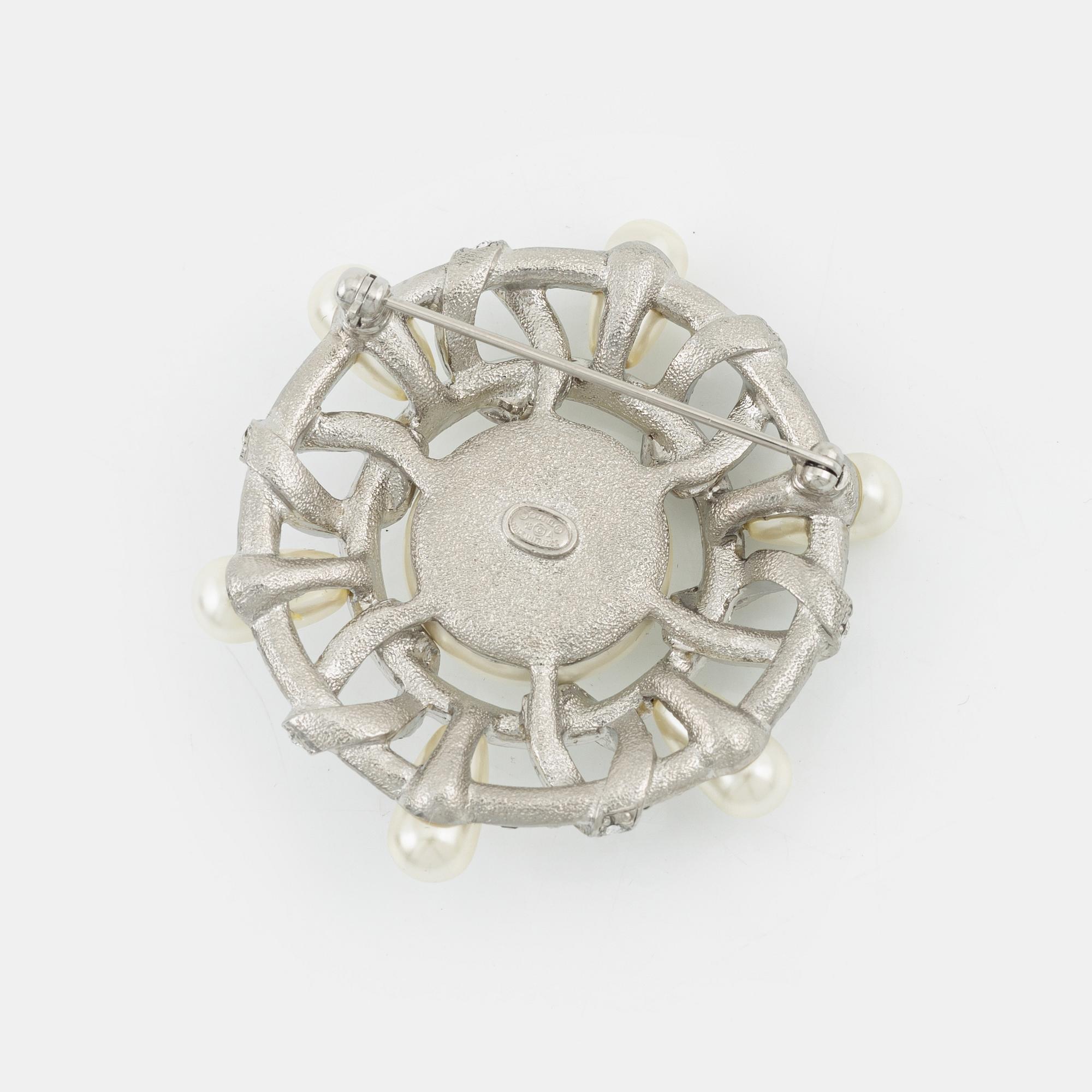 Chanel, a silvermetal, imitation pearl and crystal brooch, 2018.