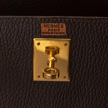 Hermès, a chocolate leather 'Kelly' handbag, 1995.