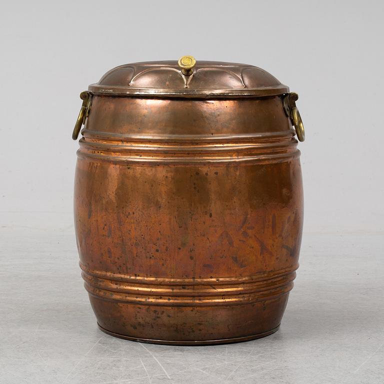 A 19th century copper water barrel.
