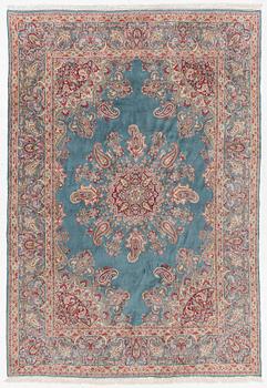 A Kirman carpet, c. 335 x 232 cm.