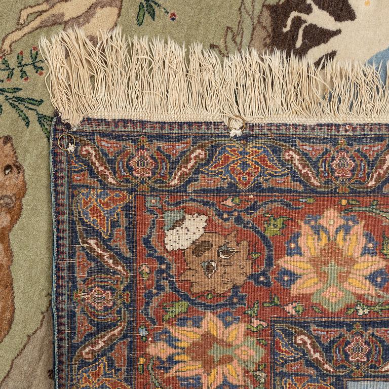 A carpet, semi-antique, Tabriz, signed, ca 271 x 175 cm.