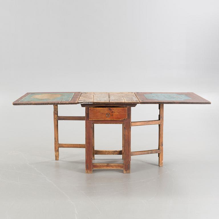 A mid 19th century gateleg table.