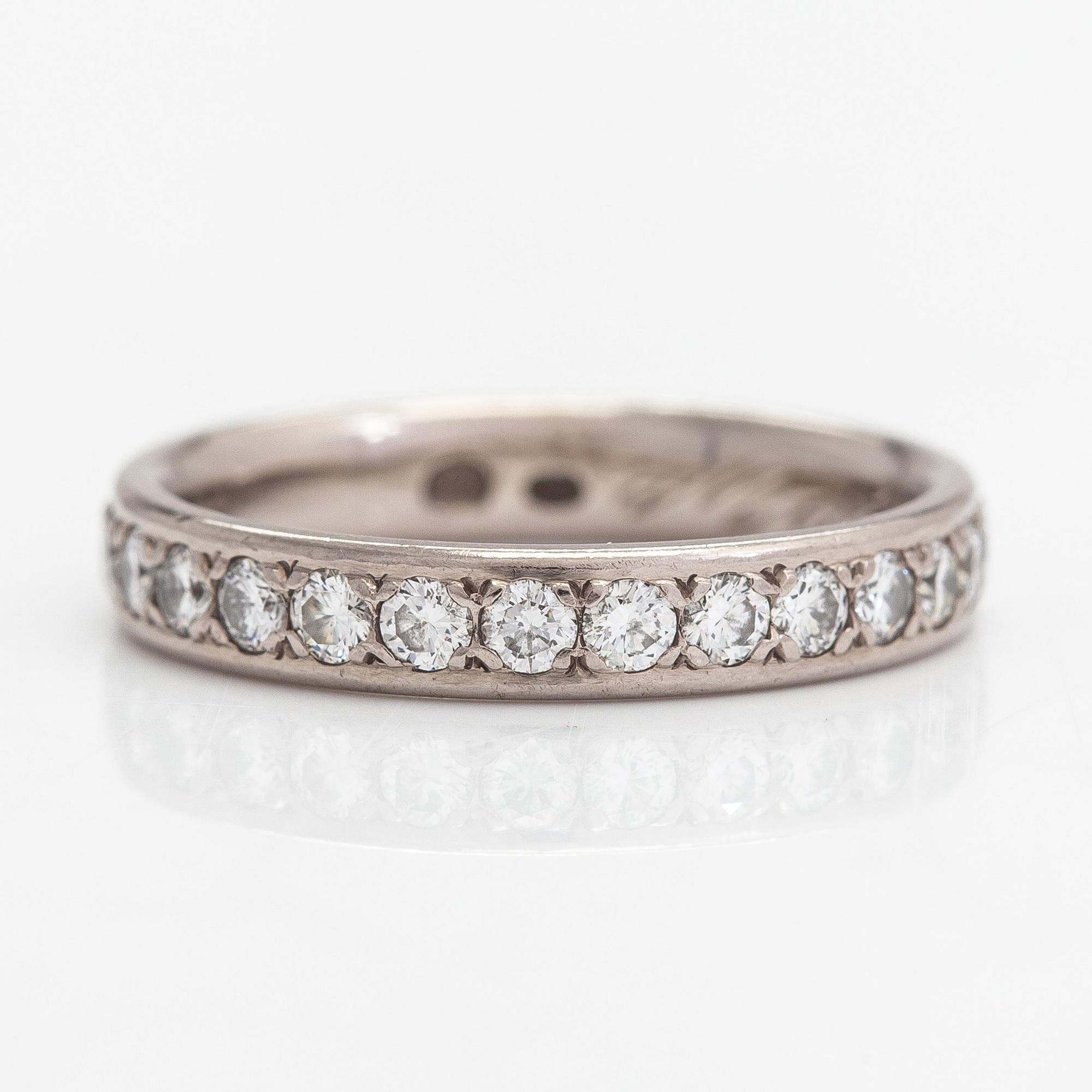 An 18K palladium white gold eternity ring with brilliant cut diamonds approx. 0.81 ct in total.