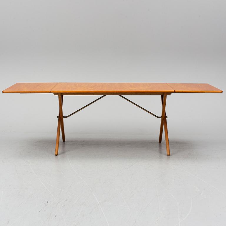 HANS J WEGNER, a teak and oak drop-leaf dining table, Andreas Tuck, Denmark 1950'-60's.