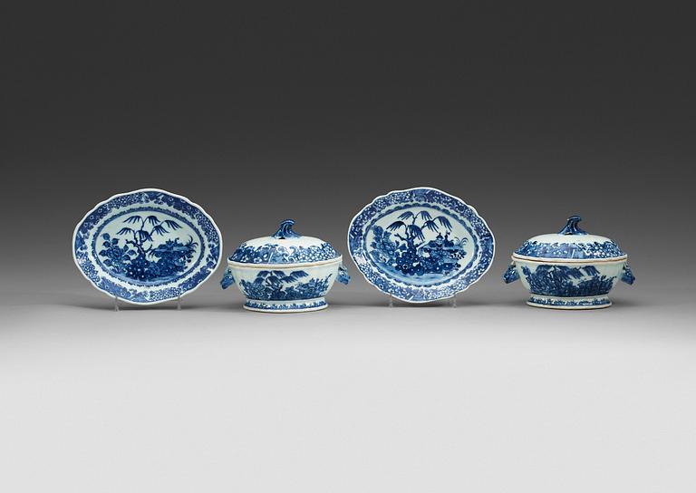 A pair of blue and white butter tureens with covers and stands, Qing dynasty, Qianlong (1736-95).